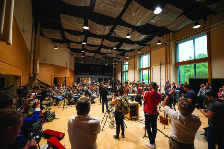 C. Film scoring session in the renowned Galaxy Hall